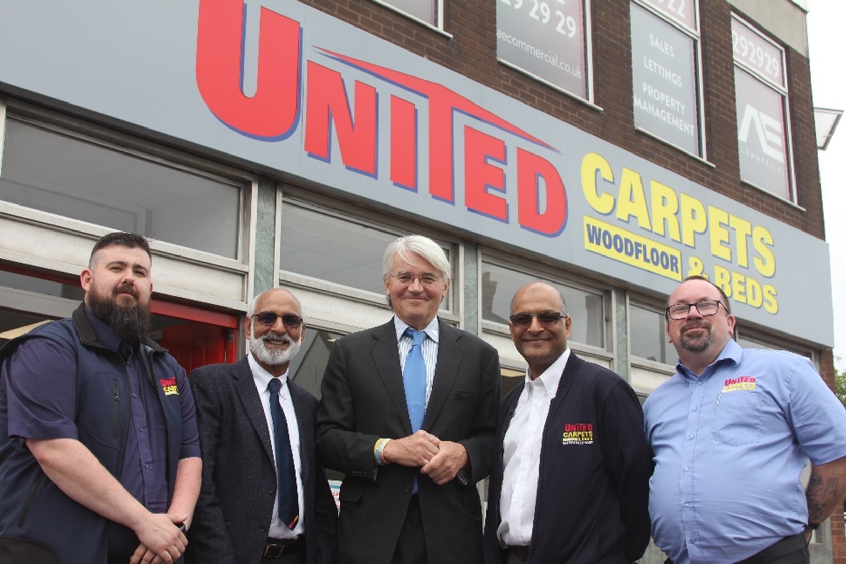 Andrew Mitchell at the opening of the new United Carpets outlet