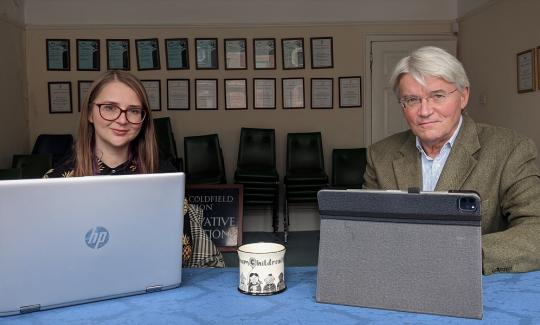 Andrew Mitchell MP in his constituency office with Henrietta Brealey