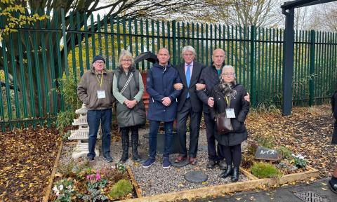Andrew Mitchell attends the opening of a memorial garden at Plantsbrook School in memory of student Louis Watkiss